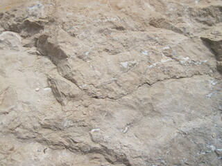 Textured stone wall. Natural stone background. Rock texture backgrounds close up.