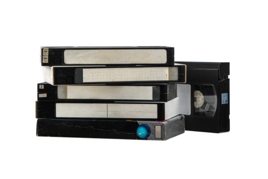 Pile of VHS video cassettes. Vintage media. Isolate on a white back.