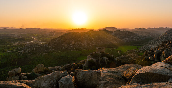 View over rocky landscape from Hanuman Temple, Hampi,  India at sunset