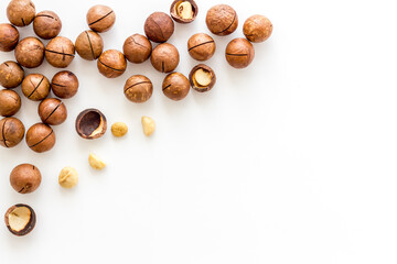 Obraz na płótnie Canvas Flat lay of macadamia nuts, top view. Healthy protein food background