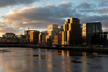 Fototapeta na wymiar Glasgow cityscape seen from the river Clyde, Scotland
