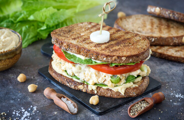 Chickpea salad sandwich prepared and served - 581739408