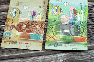 Kuwaiti half and quarter dinar paper banknotes cash money bills currency features Kuwait Towers, a...