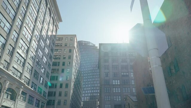 Sun shining behind the buildings in dumbo district, NYC