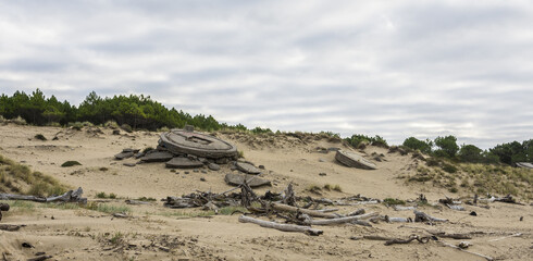 Destroyed entrance of a World War 2 bunker hidden in the dunes on a French beach (la Grande C&ocirc;te) at Saint-Palais-sur-Mer next to Royan.