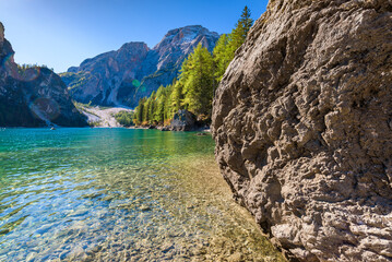 Braies Lake in Dolomites mountains Sudtirol, Italy. The lake is surrounded by forest famous for scenic hiking trails.
