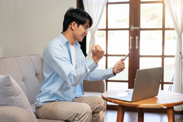 Businessman in casual is sitting on comfortable sofa and chattin