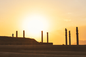 Persepolis, Iran - 8th june, 2022: tourist walk by giant column statues - Gates of all nations....