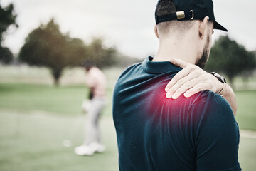 Fototapeta Sports, injury and golf, man with shoulder pain during game on course, massage and relief in health and wellness. Green, hands on muscle for support and golfer with body ache during golfing workout. obraz