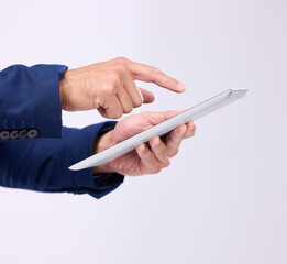 Tablet, hands and man online in studio for communication with network connection on social media. Business male typing an internet search, mobile app and email chat with contact on white background