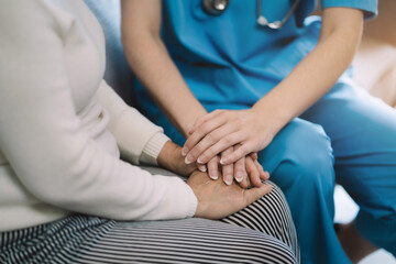 Female doctors shake hands with patients encouraging each other  To offer love, concern, and encouragement while checking the patient's health. concept of medicine.