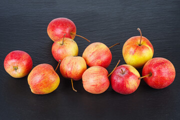 Crab apples on a black background