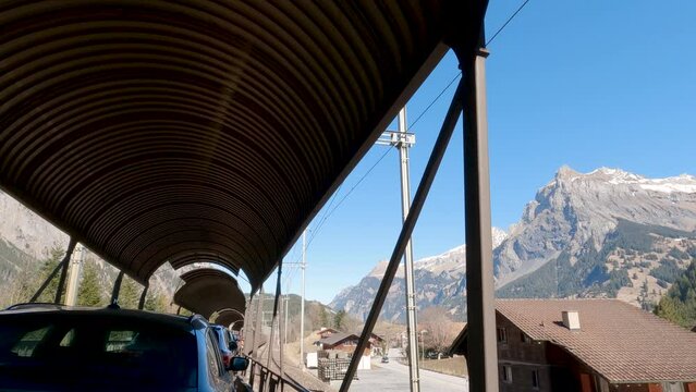Unique Transportation. Riding on the Lotschberg Car Train. Beautiful Landscape. Switzerland. Slow Motion