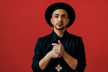 Confident trans male wearing black outfit