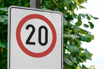 Post with traffic sign Speed Limit outdoors