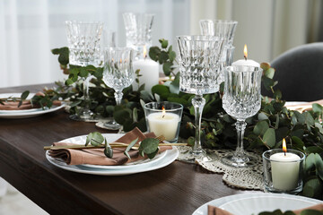 Stylish elegant table setting for festive dinner indoors
