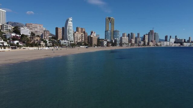 Bird's eye view over the Mediterranean Sea to the Levante beach of Benidorm with its skyscrapers in the Spanish province of Alicante