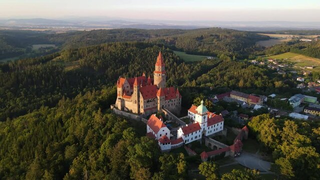 Aerial video of Bouzov Castle in Moravia, Czech Republic. Beautiful fairytale castle at sunset. 