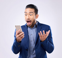 Business man, phone and wow for success in studio for winning, deal or bonus notification. Excited...