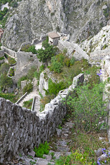 stone carved stairs to the upper part of the San Giovani Fortress walls above the old adriatic town of Kotor, Montenegro