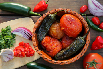 Ingredients for tasty salsa sauce on wooden table, flat lay