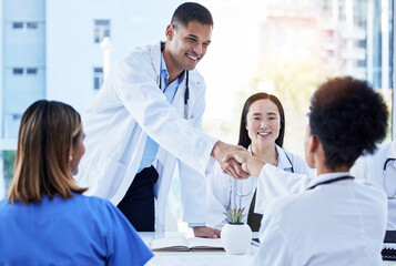 Handshake, doctors and medical meeting in agreement, collaboration and smile of teamwork, welcome...