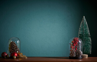 Christmas and new year accessory on the table and green background, cone, tree, frame.