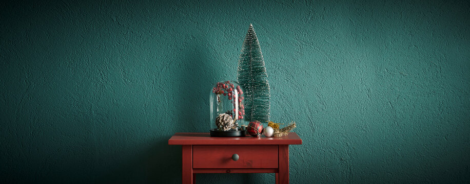 Christmas and new year accessory on the red table and green background, cone, tree.
