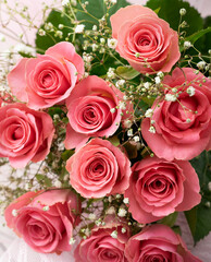 Bouquet of fresh, bright, pink roses. Floral background, holiday background, close-up, selective focus