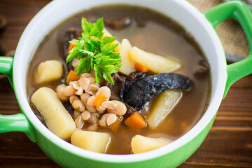 mushroom hot soup with beans in a bowl