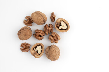 heap of walnuts isolated on white background