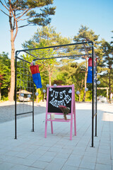 Outdoor wedding hall with just married written on the signboard