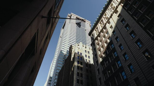 Tracking shot of tall buildings in New York, Financial district