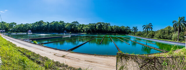 A view of a water treatment facility on Roatan Island on a sunny day