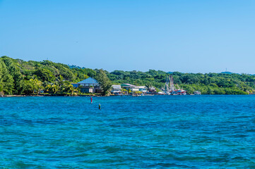 A view towards a village on Roatan Island on a sunny day