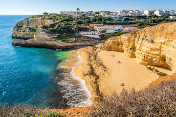 Foto auf Acrylglas Strand Marinha, Algarve, Portugal Beautiful Benagil town and beach by the Atlantic Ocean in Algarve, Portugal