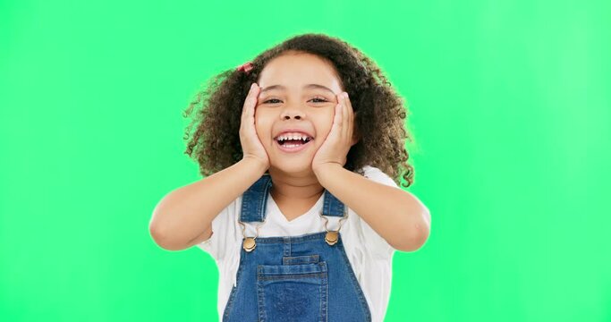 Excited, cheering and girl shake head, green screen and achievement with happiness, cheerful and smile. Female child, young person or kid shaking hair, celebration or motivation with joy or happiness