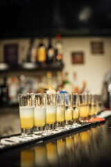 Vertical shot of cocktails in the bar