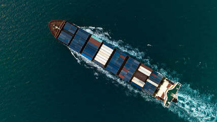 cargo container ship full speed sailing in sea to import export goods of international  and worldwide, by container ship Transport, business and industry delivery service, photograph aerial view .