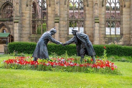 Sculpture "All Together Now" by Andy Edwards outside the bombed out church of St John's in Liverpool
