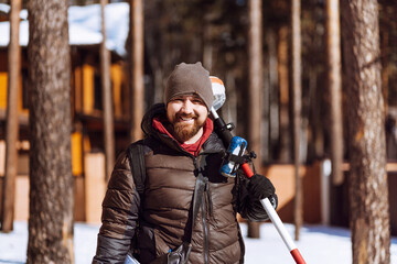 Surveyor engineer with GPS equipment smiling at the camera. Working specialties.
