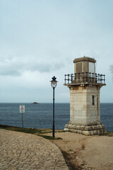 Fototapeta na wymiar Old lighthouse in the Adriatic sea harbour of historic Rovinj Istria Croatia