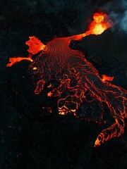 Vertical shot of lava flowing over rocky surface during 2022 Meradalir volcano eruption, Iceland