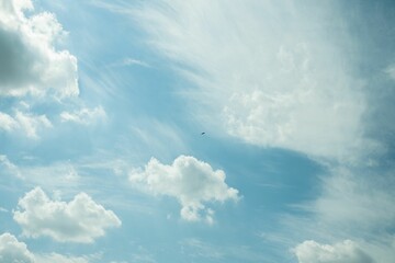 Naklejka na ściany i meble Beautiful cloudscape on a sunny day