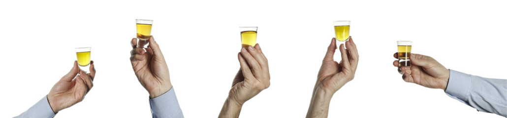 man's hand with a shot of whiskey isolated