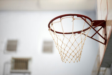 basketball hoop in the gym. Slow motion of a basketball hoop during a workout. basketball hoop,...
