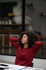 American African Woman working with computer phone and Tablet outdoor.
