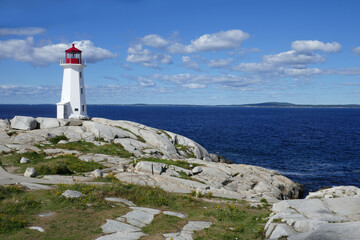 Fototapeta na wymiar Lighthouse at Peggys Cove in Nova Scotia, Canada