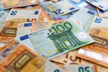 Close-up shot of scattered Euro banknotes