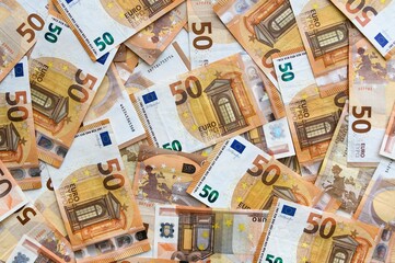 Close-up shot of scattered 50 Euro banknotes